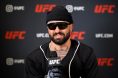 Josh Hokit takes questions during a UFC media day session