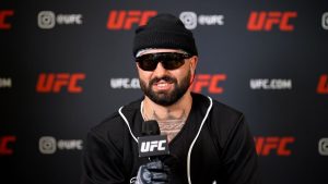 Josh Hokit takes questions during a UFC media day session
