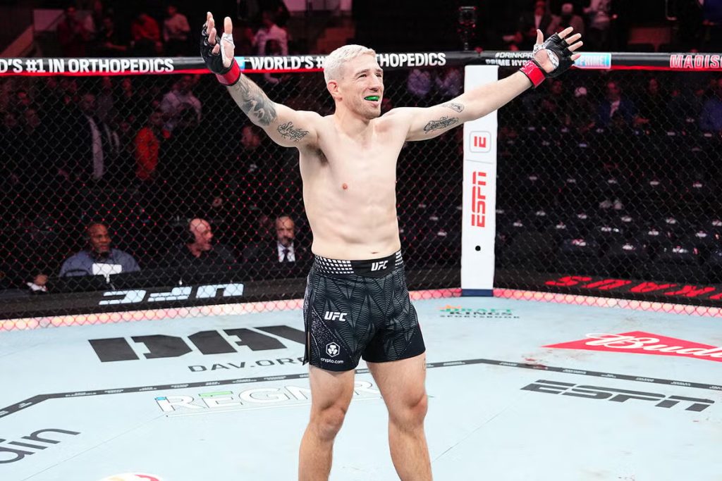 Kyle Daukaus celebrates UFC 322 win