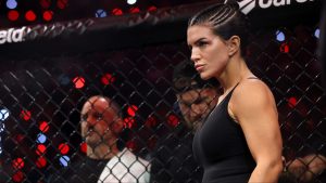 Gina Carano enters the cage for her fight against Ronda Rousey