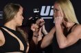 Ronda Rousey and Holly Holm face off at a press conference