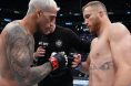 Charles Oliveira and Justin Gaethje touch gloves at UFC 274