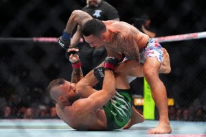 Conor McGregor defeated by Max Holloway after suffering right leg injury at UFC 329