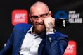Conor McGregor speaks to media members during a UFC 257 press event