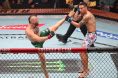 Conor McGregor suffers a knee injury after failing to connect with a leaping kick at UFC 329
