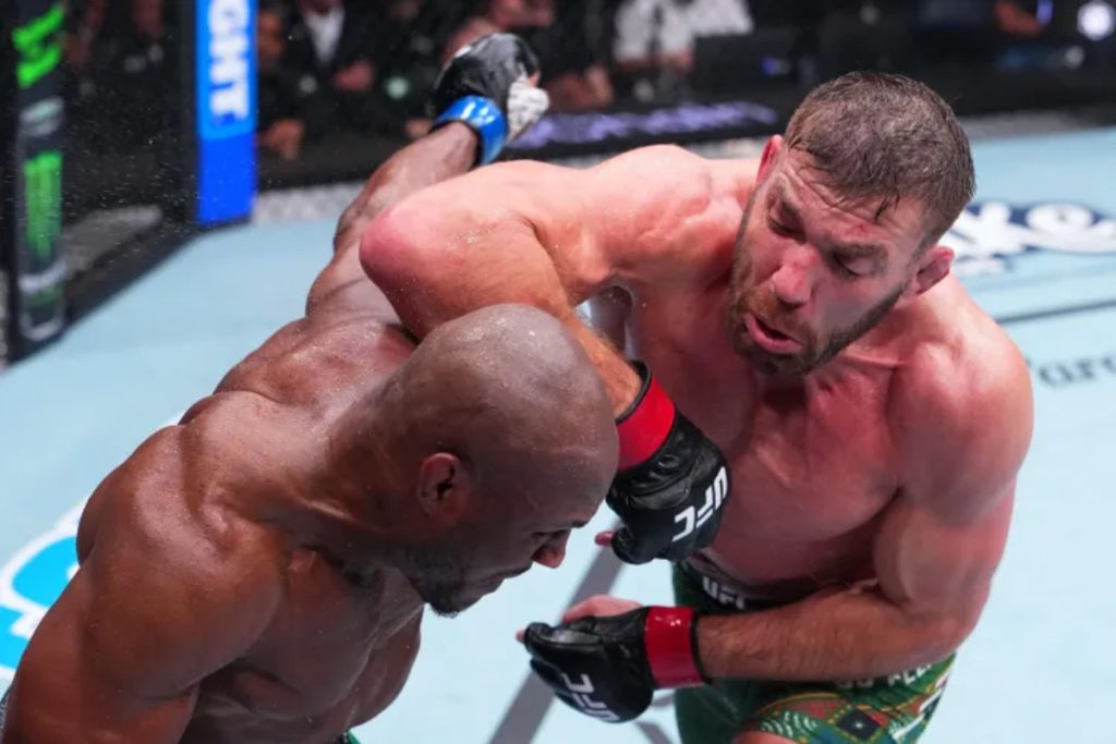 Dricus du Plessis delivers a strike to Kamaru Usman during his UFC OKC victory