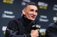Max Holloway speaks to reporters during a UFC 326 press conference