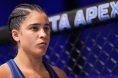 Gigi Canuto enters the Octagon for her fight during TUF 34
