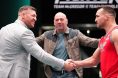 Conor McGregor and Michael Chandler shake hands on the TUF set