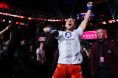 Paddy Pimblett dances during his UFC 329 walkout prior to choking out Benoit Saint Denis