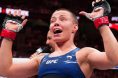 Rose Namajunas reacts as score totals are being read after her UFC fight
