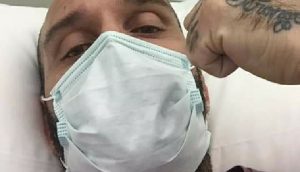 Cristian Binda wearing a health mask